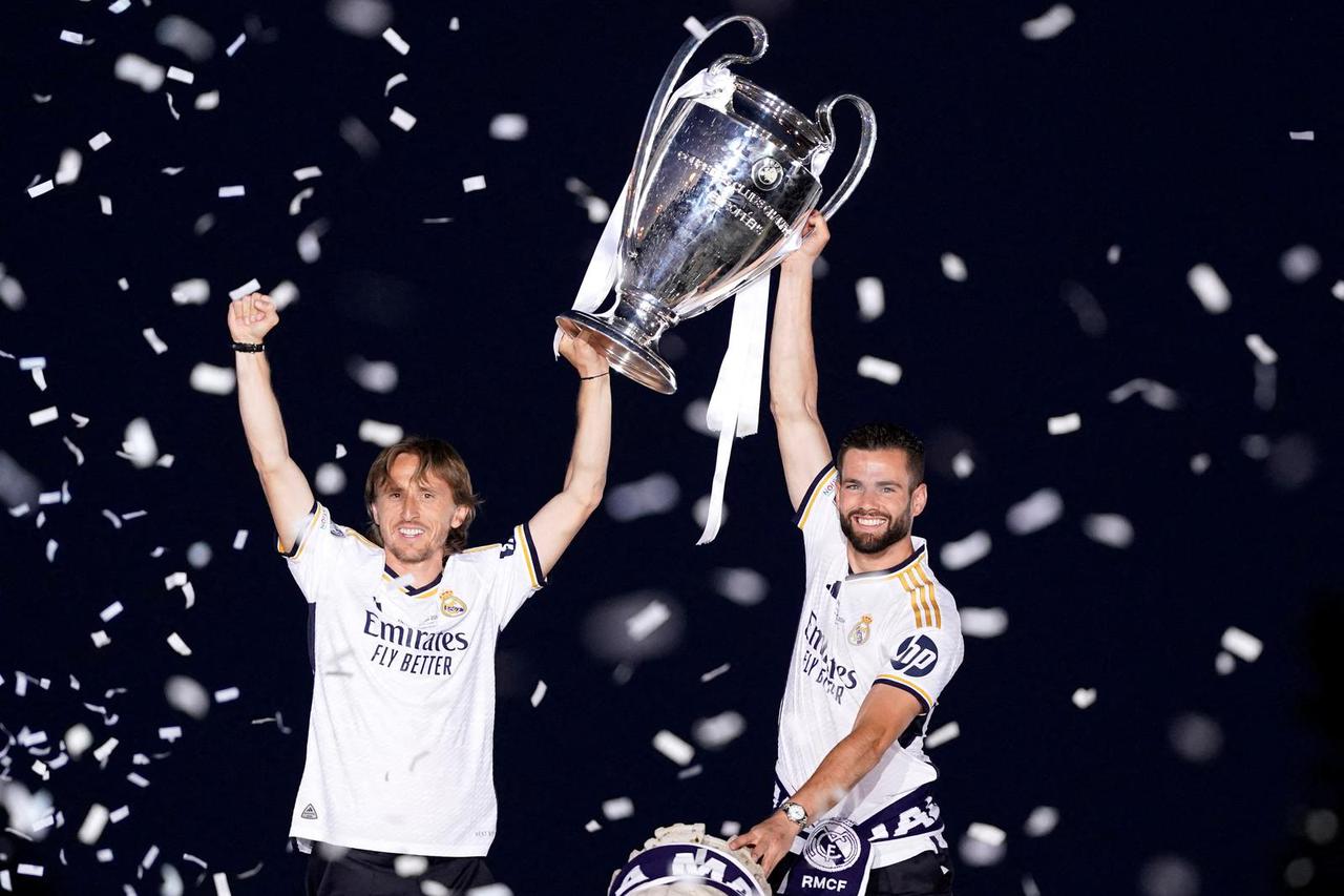 FILE PHOTO: Real Madrid celebrate winning the Champions League