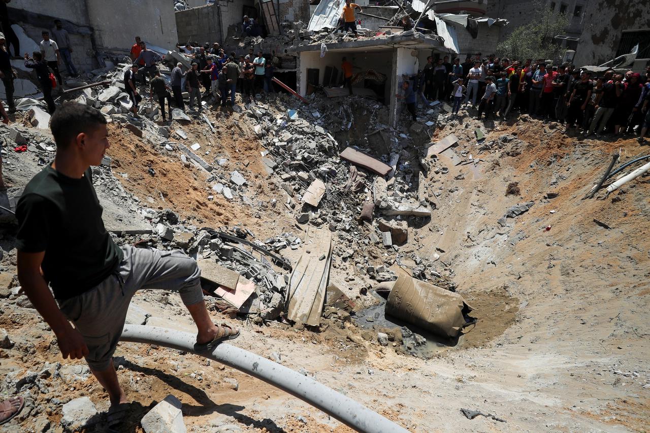 Aftermath of an Israeli strike on a house, in Jabalia