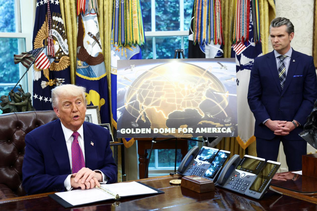 U.S. President Donald Trump and U.S. Defense Secretary Pete Hegseth make an announcement at the White House in Washington